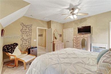Welcome to a bright and inviting Lowcountry-style home in the on Long Cove Club in South Carolina - for sale on GolfHomes.com, golf home, golf lot