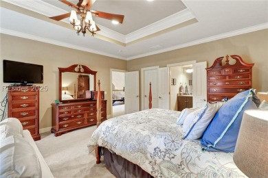 Welcome to a bright and inviting Lowcountry-style home in the on Long Cove Club in South Carolina - for sale on GolfHomes.com, golf home, golf lot