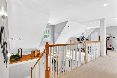 Welcome to a bright and inviting Lowcountry-style home in the on Long Cove Club in South Carolina - for sale on GolfHomes.com, golf home, golf lot