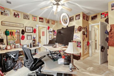 Welcome to a bright and inviting Lowcountry-style home in the on Long Cove Club in South Carolina - for sale on GolfHomes.com, golf home, golf lot