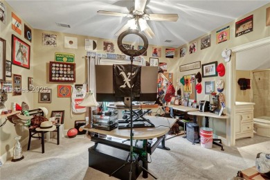Welcome to a bright and inviting Lowcountry-style home in the on Long Cove Club in South Carolina - for sale on GolfHomes.com, golf home, golf lot