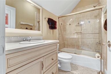 Welcome to a bright and inviting Lowcountry-style home in the on Long Cove Club in South Carolina - for sale on GolfHomes.com, golf home, golf lot