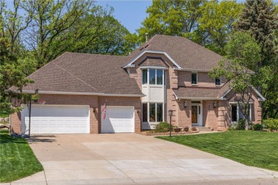 Nestled in the prestigious Wedgewood Estates, this executive on Prestwick Golf Club At Wedgewood in Minnesota - for sale on GolfHomes.com, golf home, golf lot