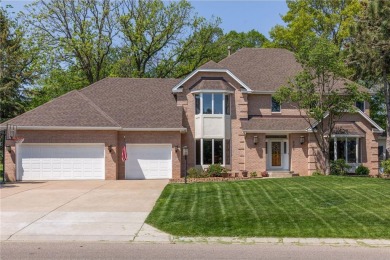 Nestled in the prestigious Wedgewood Estates, this executive on Prestwick Golf Club At Wedgewood in Minnesota - for sale on GolfHomes.com, golf home, golf lot