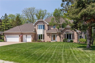 Nestled in the prestigious Wedgewood Estates, this executive on Prestwick Golf Club At Wedgewood in Minnesota - for sale on GolfHomes.com, golf home, golf lot