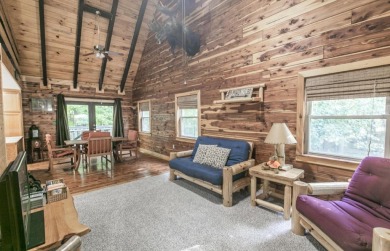 Welcome to Timber Cottage - This charming log home, built in on Apple Valley Golf Course in Ohio - for sale on GolfHomes.com, golf home, golf lot