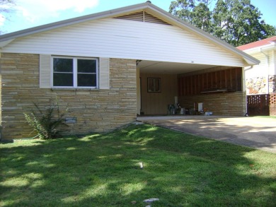 Nice remodeled manor home on the market priced to sell.  It is a on Cedar Glade Golf Course in Arkansas - for sale on GolfHomes.com, golf home, golf lot