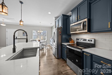 Set in Tillery Tradition, this home offers a relaxed, active on The Tillery Tradition Country Club in North Carolina - for sale on GolfHomes.com, golf home, golf lot