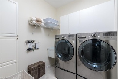 Rarely available, this lovely coach home has 3 bedrooms, and 3 on Bonita Bay West in Florida - for sale on GolfHomes.com, golf home, golf lot