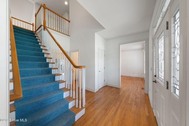 This quintessential low country style home designed by famous on Members Club At St. James Plantation in North Carolina - for sale on GolfHomes.com, golf home, golf lot