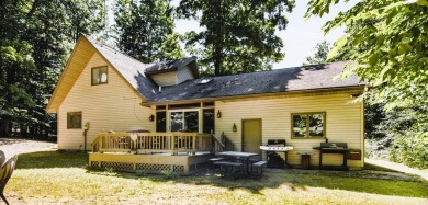 Enjoy Northern Michigan living in this spacious Chalet style on Schuss Mountain Golf Club in Michigan - for sale on GolfHomes.com, golf home, golf lot