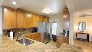 Elegant and beautifully furnished 3-bedroom, 2-bath condo in on Palm-Aire Country Club and Resort - Palms in Florida - for sale on GolfHomes.com, golf home, golf lot