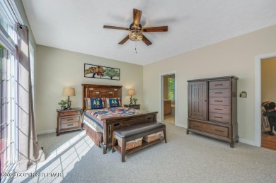 A golfer's paradise!  A striking Pinecrest contemporary with a on Pinecrest Lake Golf and Country Club in Pennsylvania - for sale on GolfHomes.com, golf home, golf lot