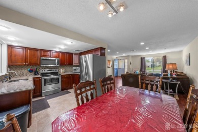 Public: Discover easy one-level living in this charming end unit on Clearbrook Golf Club in New Jersey - for sale on GolfHomes.com, golf home, golf lot