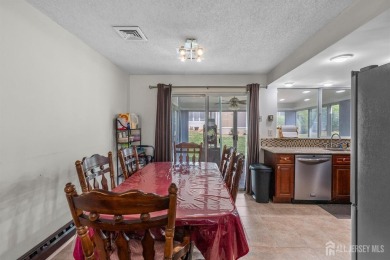 Public: Discover easy one-level living in this charming end unit on Clearbrook Golf Club in New Jersey - for sale on GolfHomes.com, golf home, golf lot