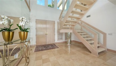 This impeccably updated waterfront residence in the prestigious on Longboat Key Golf Club Resort in Florida - for sale on GolfHomes.com, golf home, golf lot