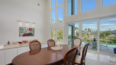 This impeccably updated waterfront residence in the prestigious on Longboat Key Golf Club Resort in Florida - for sale on GolfHomes.com, golf home, golf lot