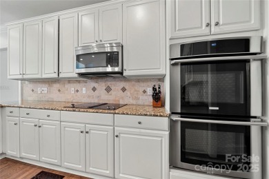 Nestled in the Providence Country Club community, this 1.5-story on The Club At Longview in North Carolina - for sale on GolfHomes.com, golf home, golf lot
