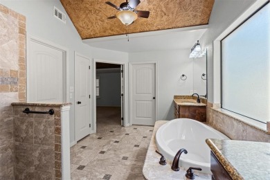Welcome to this stunning brick and stone home located in the on Pecan Plantation Country Club in Texas - for sale on GolfHomes.com, golf home, golf lot