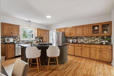 This classic farmhouse has been thoughtfully updated, blending on Red Oak Golf Course in Minnesota - for sale on GolfHomes.com, golf home, golf lot