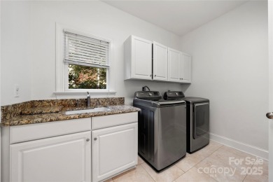 Nestled in the Providence Country Club community, this 1.5-story on The Club At Longview in North Carolina - for sale on GolfHomes.com, golf home, golf lot