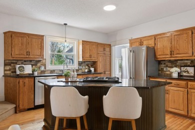 This classic farmhouse has been thoughtfully updated, blending on Red Oak Golf Course in Minnesota - for sale on GolfHomes.com, golf home, golf lot