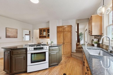 This classic farmhouse has been thoughtfully updated, blending on Red Oak Golf Course in Minnesota - for sale on GolfHomes.com, golf home, golf lot