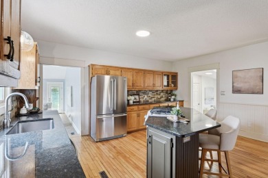 This classic farmhouse has been thoughtfully updated, blending on Red Oak Golf Course in Minnesota - for sale on GolfHomes.com, golf home, golf lot