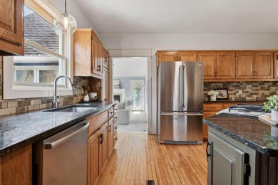 This classic farmhouse has been thoughtfully updated, blending on Red Oak Golf Course in Minnesota - for sale on GolfHomes.com, golf home, golf lot