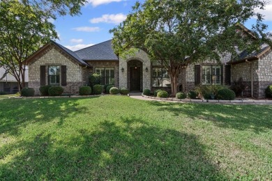 Welcome to this stunning brick and stone home located in the on Pecan Plantation Country Club in Texas - for sale on GolfHomes.com, golf home, golf lot
