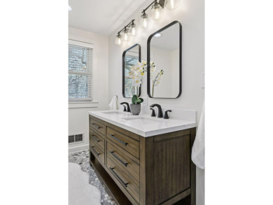 This classic farmhouse has been thoughtfully updated, blending on Red Oak Golf Course in Minnesota - for sale on GolfHomes.com, golf home, golf lot