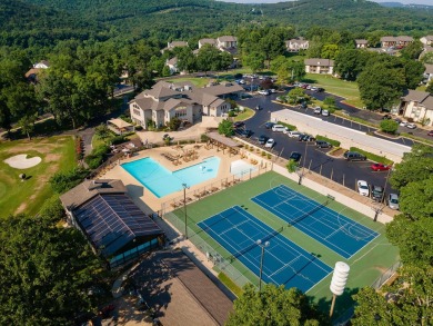 Discover the perfect blend of relaxation and recreation in this on Pointe Royale Village Country Club in Missouri - for sale on GolfHomes.com, golf home, golf lot