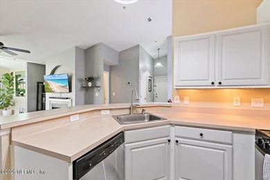 Top-Floor Condo with Golf Views | 8 Minutes to the Beach | Dual on Windsor Parke Golf Club in Florida - for sale on GolfHomes.com, golf home, golf lot