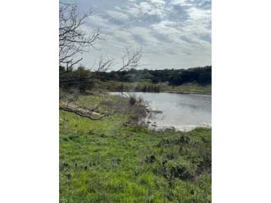 Lot borders seasonal pond so great view and atmosphere. Please on Slick Rock Golf Course - Horseshoe Bay in Texas - for sale on GolfHomes.com, golf home, golf lot
