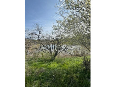Lot borders seasonal pond so great view and atmosphere. Please on Slick Rock Golf Course - Horseshoe Bay in Texas - for sale on GolfHomes.com, golf home, golf lot