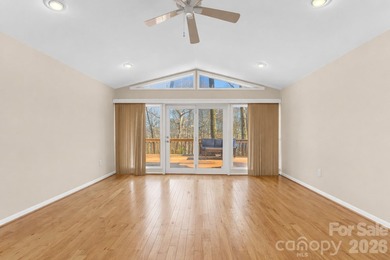 Wake up each day to breathtaking long-range mountain views and on High Vista Country Club in North Carolina - for sale on GolfHomes.com, golf home, golf lot