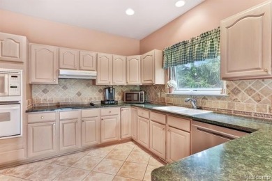 Situated on a prime lot in the exclusive Orchards Golf Course on The Orchards Golf Club in Michigan - for sale on GolfHomes.com, golf home, golf lot