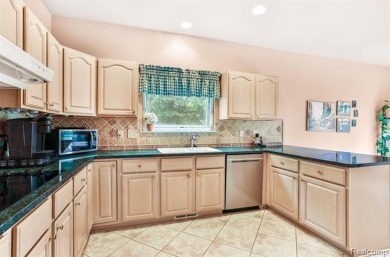 Situated on a prime lot in the exclusive Orchards Golf Course on The Orchards Golf Club in Michigan - for sale on GolfHomes.com, golf home, golf lot