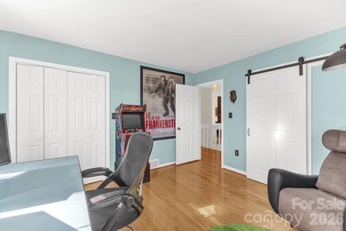 Wake up each day to breathtaking long-range mountain views and on High Vista Country Club in North Carolina - for sale on GolfHomes.com, golf home, golf lot