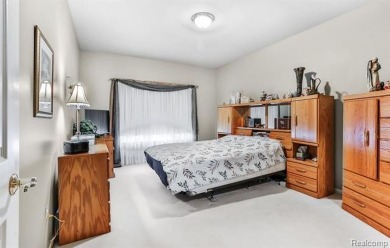 Situated on a prime lot in the exclusive Orchards Golf Course on The Orchards Golf Club in Michigan - for sale on GolfHomes.com, golf home, golf lot