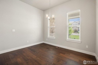 Welcome to this beautiful 3-bedroom, 3.5-bath end-unit townhome on Highland Meadows Golf Course in Colorado - for sale on GolfHomes.com, golf home, golf lot