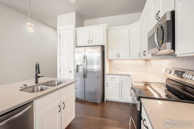 Welcome to this beautiful 3-bedroom, 3.5-bath end-unit townhome on Highland Meadows Golf Course in Colorado - for sale on GolfHomes.com, golf home, golf lot