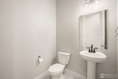 Welcome to this beautiful 3-bedroom, 3.5-bath end-unit townhome on Highland Meadows Golf Course in Colorado - for sale on GolfHomes.com, golf home, golf lot