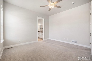 Welcome to this beautiful 3-bedroom, 3.5-bath end-unit townhome on Highland Meadows Golf Course in Colorado - for sale on GolfHomes.com, golf home, golf lot