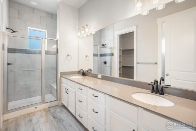 Welcome to this beautiful 3-bedroom, 3.5-bath end-unit townhome on Highland Meadows Golf Course in Colorado - for sale on GolfHomes.com, golf home, golf lot