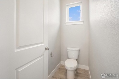 Welcome to this beautiful 3-bedroom, 3.5-bath end-unit townhome on Highland Meadows Golf Course in Colorado - for sale on GolfHomes.com, golf home, golf lot