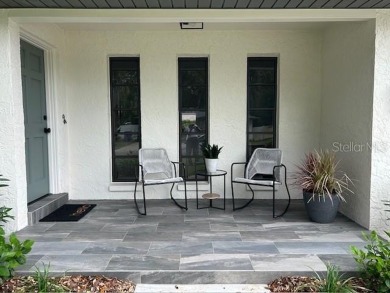 Experience the best of Dunedin living in this meticulously on The Dunedin Country Club in Florida - for sale on GolfHomes.com, golf home, golf lot