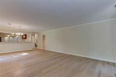 Welcome to this inviting 3-bedroom, 2.5-bath end-unit townhome on Kingsmill Resort and Golf Club in Virginia - for sale on GolfHomes.com, golf home, golf lot