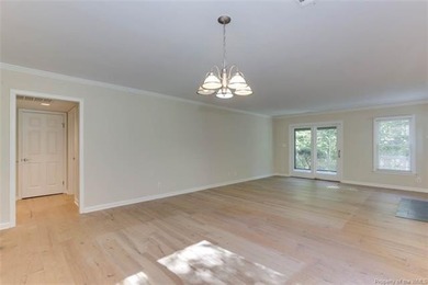 Welcome to this inviting 3-bedroom, 2.5-bath end-unit townhome on Kingsmill Resort and Golf Club in Virginia - for sale on GolfHomes.com, golf home, golf lot