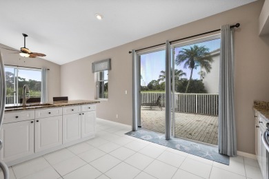 Soak in serene lake views with a backdrop of the golf course in on Santa Lucia River Club in Florida - for sale on GolfHomes.com, golf home, golf lot
